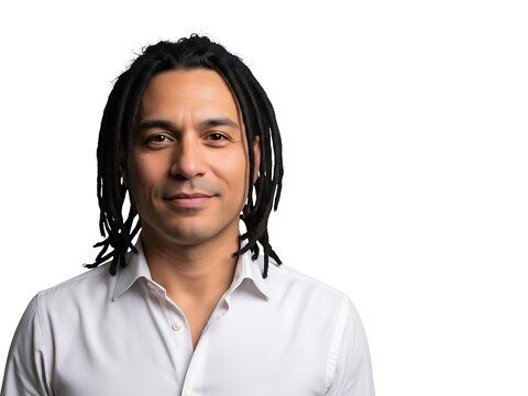 Portrait of a man with dreadlocks wearing a light shirt on white background