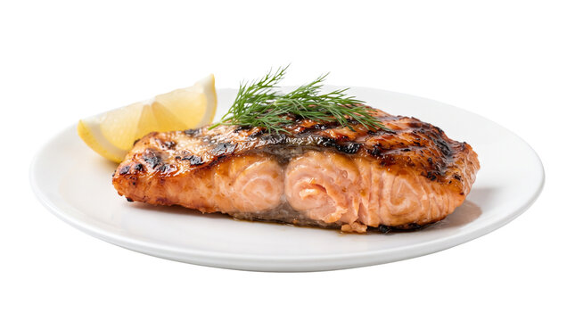 Grilled salmon fillet with lemon and dill on white plate. Roasted fish steak, healthy seafood dinner, isolated on white background.