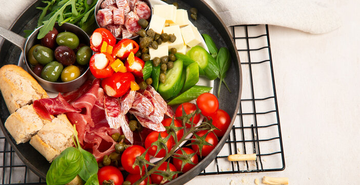 Mediterranean appetizers or antipasto, assorted Italian food.