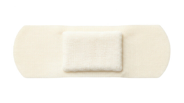 Una tirita adhesiva de color beige aislada sobre un fondo blanco, vista cenital de un vendaje m&eacute;dico rectangular con una almohadilla central suave, ideal para primeros auxilios y cuidado de heridas.