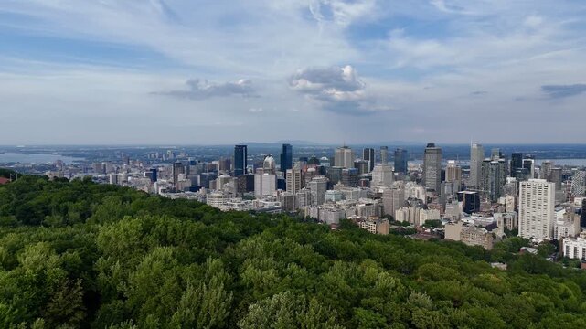 Montreal downtown skyline from Mount Royal with park, lake and greenery in summer, Quebec, Canada. g.