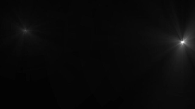 4k Paparazzi camera flashes, blinking flashlights animation on black background. Flashing lens flares, at the stadium concert multiple camera flashes on black background.  alpha channel
