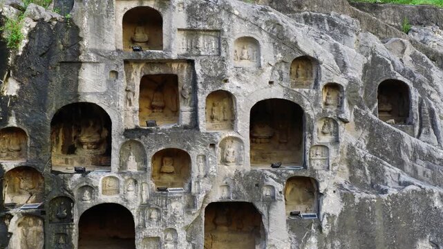 Aerial view of giant Vairocana Buddha, Longmen Grottoes, Luoyang, Henan, China, UNESCO World Heritage Site