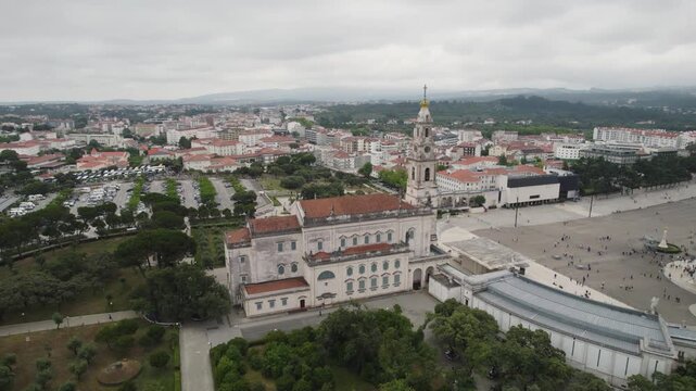 Aerial view of Sanctuary of Our Lady of Fatima in Portugal showing basilica and plaza.