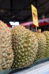 Close up of durian stand stall in bangkok on the street © Dontree