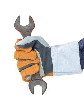 Hand in glove holding spanner on white Background