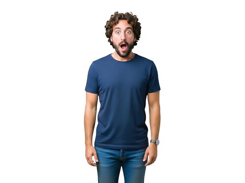 A man with curly hair stands with a surprised expression on his face