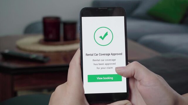 Person checks a claims app as a Rental Car Coverage Approved message appears with a green tick and View booking button.