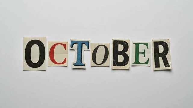 October Month Calendar Date Text Cutout Letters Arranged From Magazine Newspaper Clippings on a Plain White Background Surface