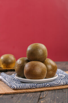 Traditional Han Luo Guo Fruits from Guilin China - Studio Food Photography with Red Background