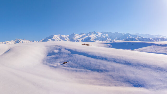 Panoramic Snow-Covered Mountain Landscape in Kyrgyzstan