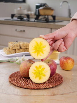 Fresh Apple Slices Showing Natural Star Pattern in Kitchen - Healthy Fruit Preparation