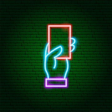 Hand Holding Red Card Neon Sign. Glowing Icon. Vector Illustration of Arbiter Soccer and Football Referree Concept Object.