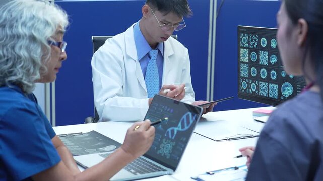 Doctor team, working on desk with laptop computer and paperwork in the office.