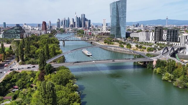 Osthafenbrucke Bridge In Hesse Germany. Modern Bowstring Arch. Downtown City. Cable Stayed Bridge. Osthafenbrucke Bridge In Frankfurt In Hesse Germany. Freeway Road. Europe Skyline.