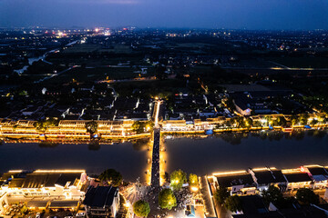 Fototapeta premium Tangqi Ancient Town Hangzhou at Night - Aerial View