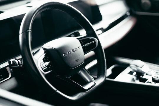 Smolensk, Russia 08.14.2026. The interior of a Chery car is visible, featuring a sleek steering wheel and dashboard design.