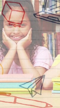 School concept icons against group of students with hands on their cheeks