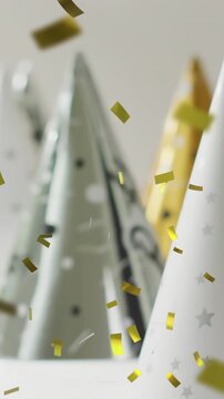 Animation of gold confetti falling and party hats