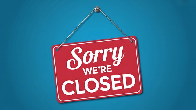 Red sorry we are closed sign on blue wall