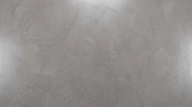 Minimalist polished concrete floor texture with soft gray gradient for modern interiors