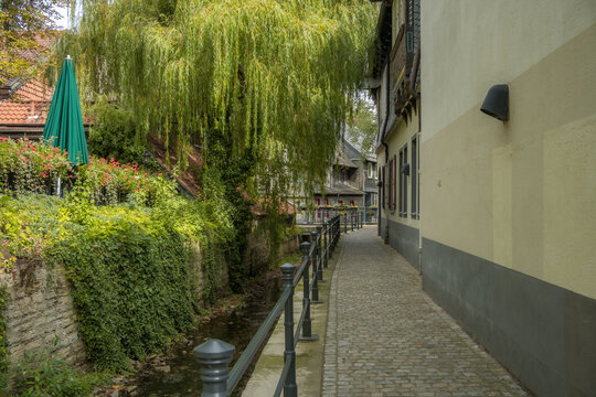 Idyllic cobblestone path along Gose river in historic Goslar Germany