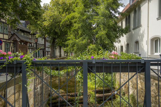 Picturesque bridge with flower boxes over Gose river in historic Goslar Germany