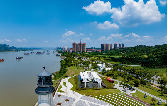 Yangtze River Lighthouse Square with Shipping Vessels and City Skyline
