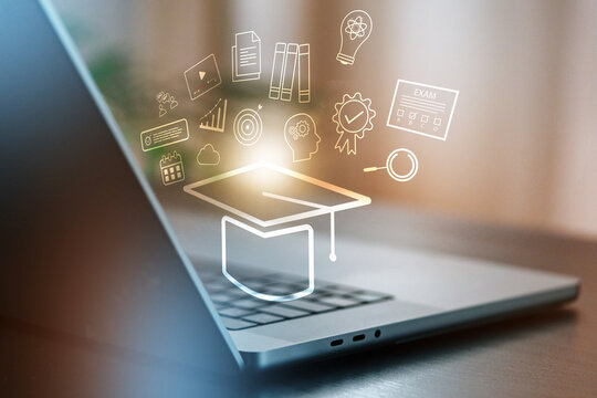 E learning tools on a laptop showing various icons of education and learning materials