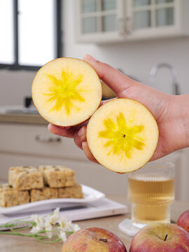 Fresh Apple Halves with Star Pattern Core in Modern Kitchen