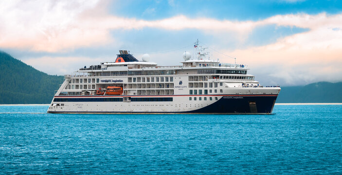Alaska, USA - July 15, 2026: Hapag Lloyd Cruise Ship Hanseatic Inspiration Sailing at Icy Strait Point in Alaska. Side View.