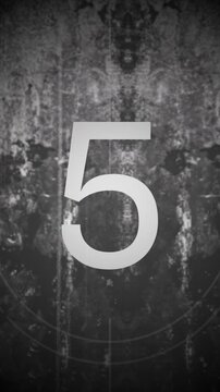 Vertical vintage film countdown leader from 10 to 0, grunge texture, scratches, dust, and retro cinema countdown animation