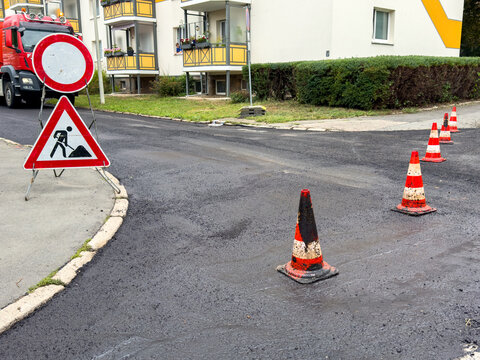 Fresh Black Asphalt Surface on Renovated City Road &ndash; Construction Site