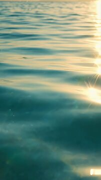 Serene Ocean Ripples with Soft Light Reflections - Gentle ripples on the ocean surface catch the soft, golden light, creating shimmering reflections.