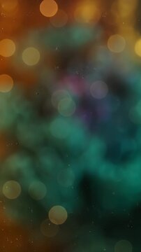 Warm and Cool Gradient Bokeh Background - This abstract background features a soft gradient blending warm orange and yellow tones into cooler teal and blue hues.