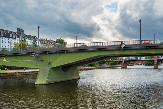 Green concrete bridge over the Main river in Frankfurt Germany