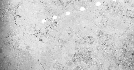 Fototapeta premium Surface with light reflections and texture in gray shades near a window