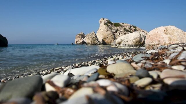 Sea waves washing Pissouri beach rocky shoreline in Cyprus
