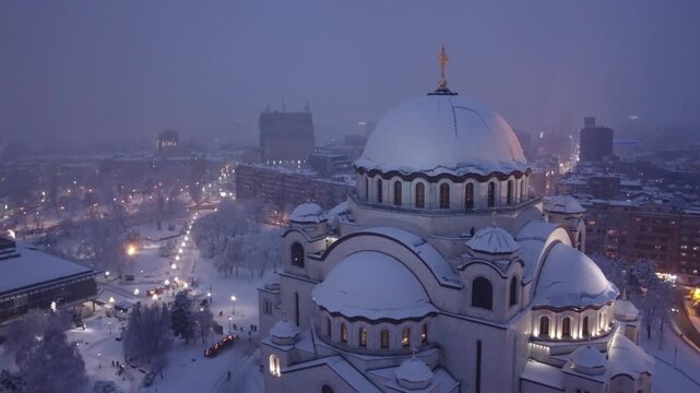 Drone view of Saint Sava, orthodox church in Belgrade, Serbia in winter snowing time.