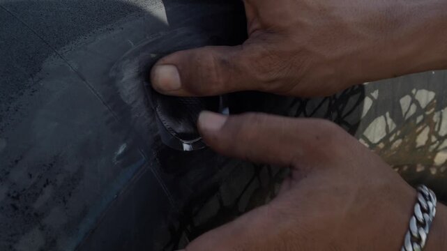 Cold patch tire repair involves applying a textured circular patch over the puncture site using adhesive and a plastic backing to repair a punctured tubeless tire.