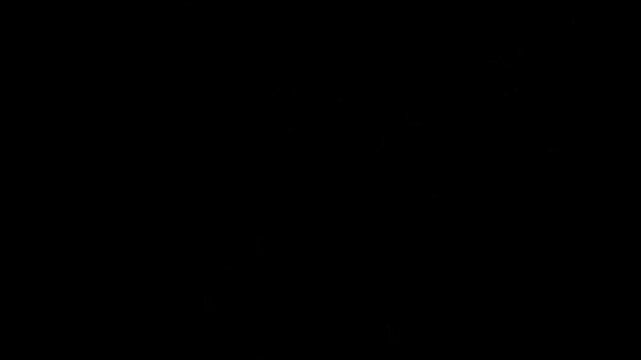 Abstract yellow light streaks radiating from a central point against a solid black background with radiating outward video abstract intensity