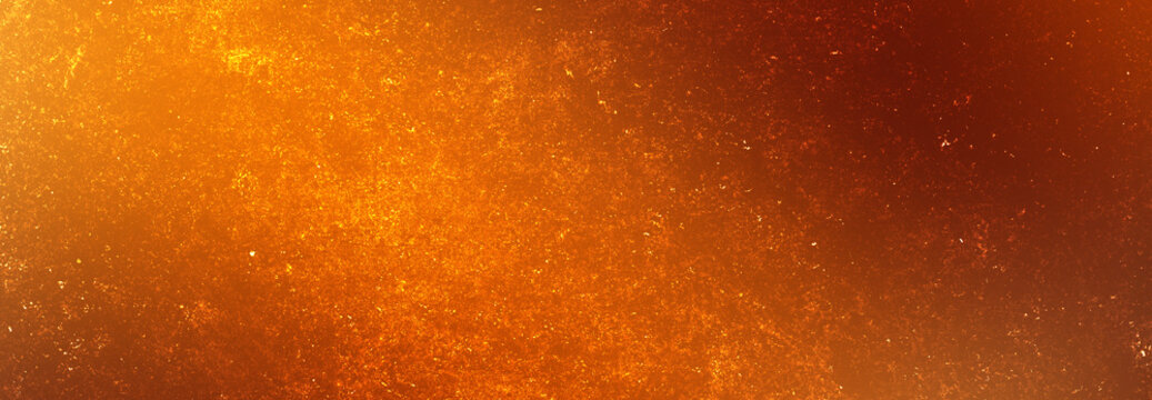Abstract bright orange texture featuring grainy particles with subtle light flare for professional digital background.