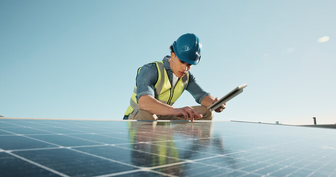 Man, electrician and solar panels outdoor with tablet, research and inspection for fault detection. Space, technician and monitor pv grid with tech, assessment and electrical testing for maintenance