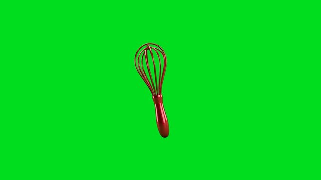 A vibrant red kitchen whisk floating against a solid bright green background