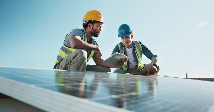 Technician, team and outdoor at solar panel with tablet, planning upgrade or innovative design. Men, talking and tech with photovoltaic grid for project management with energy source at eco building