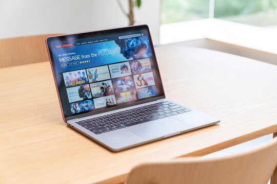 Watch video streaming services on a laptop.