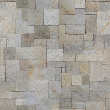 A seamless ashlar pattern stone tile texture featuring multi-sized rectangular blocks arranged in a clean, irregular layout.  