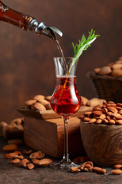 Italian liqueur Amaretto with almonds nuts.