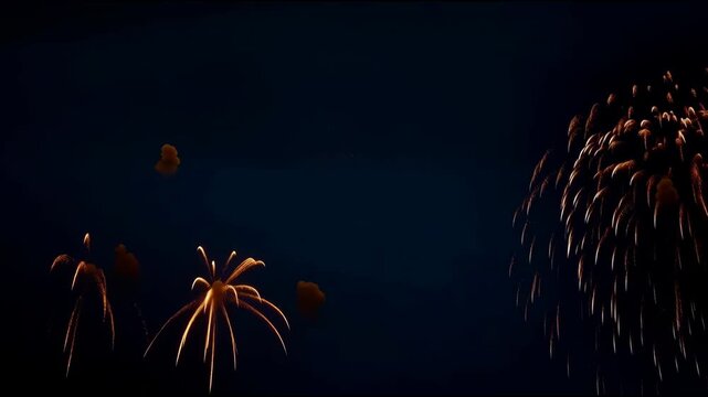 Firework Burst Across Dark Night Sky with Golden Sparks, Glowing Trails, and Celebration Display