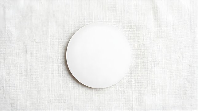 Minimalist white circle on textured fabric background for product display